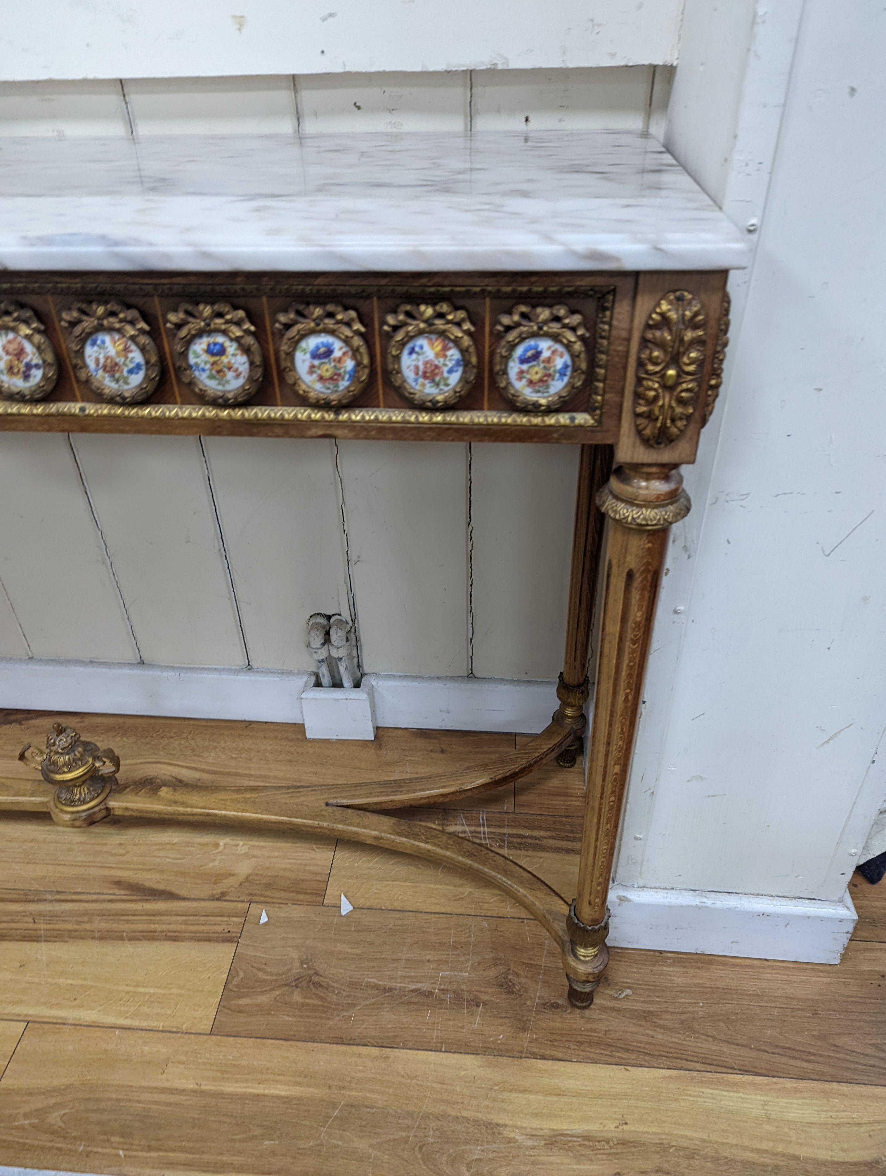 A Louis XVI style gilt metal and marble top console table, width 133cm, height 81cm
